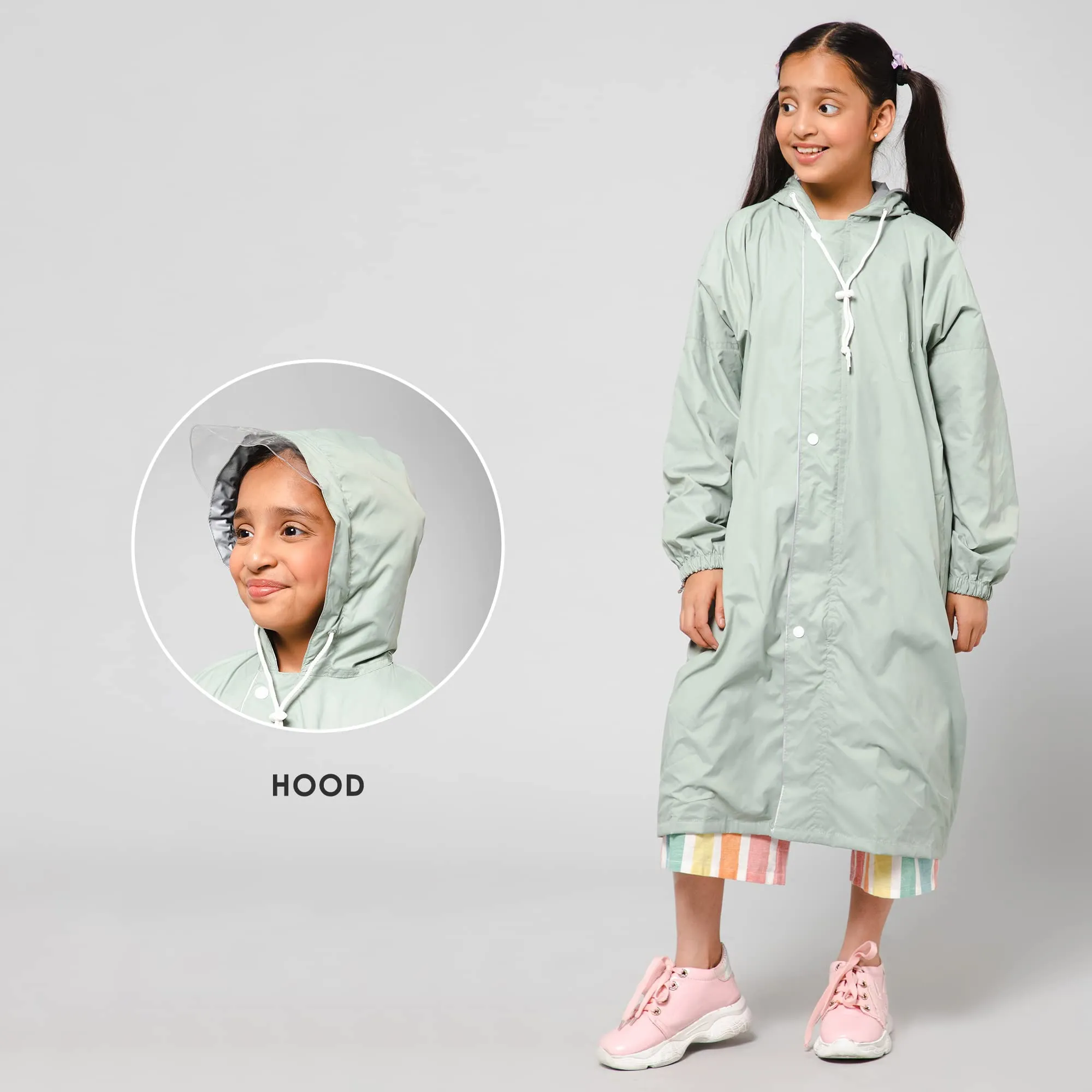 THE CLOWNFISH Cloud Chaser Series Kids Raincoat Waterproof Polyester Double Coating Reversible Longcoat with Hood and Reflector Logo at Back. Printed Plastic Pouch. Kid Age-13-14 years (Pista Green)