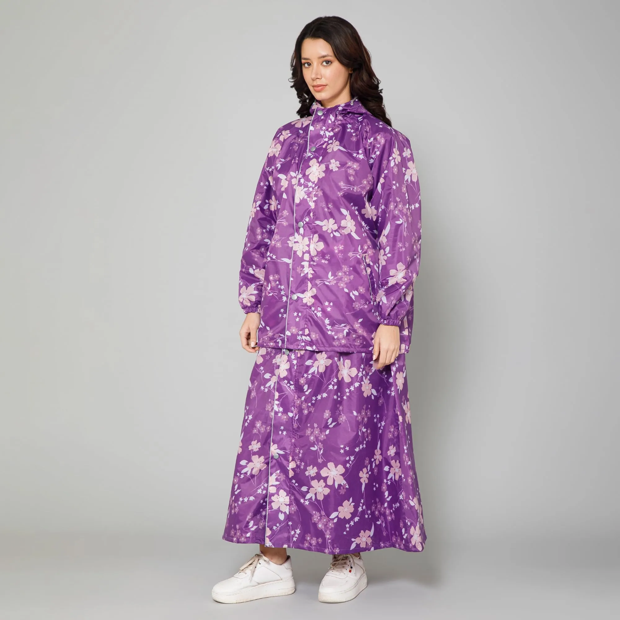 THE CLOWNFISH Polyester Waterproof Rain Coat For Women Skirt and Top Raincoat With Adjustable Hood and Front Pockets Rain Glam Series (Purple Floral, X-Large)